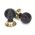 EBONISED BEEHIVE DOOR KNOBS WITH POLISHED BRASS BACKPLATES