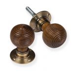 ROSEWOOD BEEHIVE DOOR KNOB WITH ANTIQUE BRASS BACKPLATES