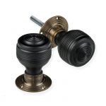 EBONISED GEORGIAN DOOR KNOBS WITH ANTIQUE BRASS BACKPLATES